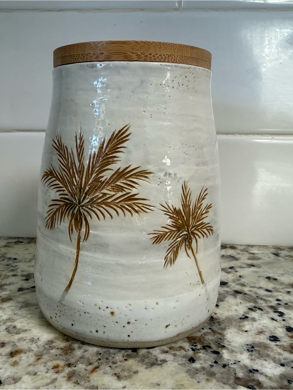 Handmade ceramic palm tree canister